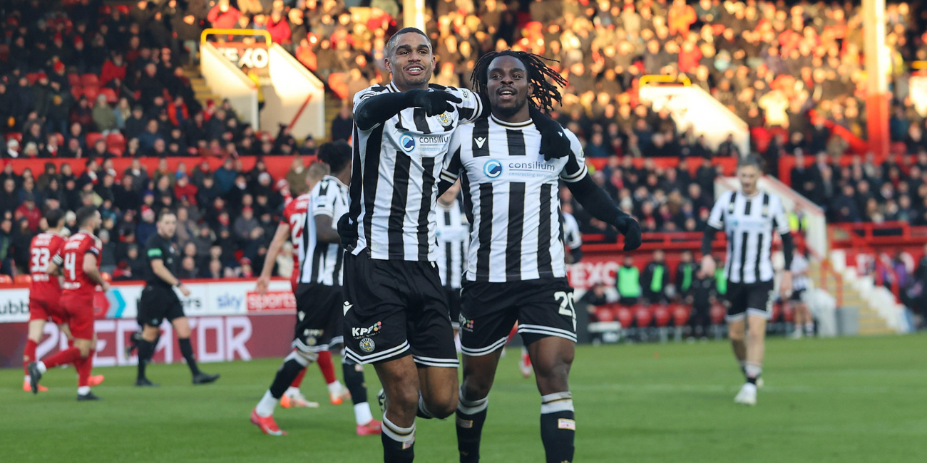 Mikael Mandron and Toyosi Olusanya celebrate