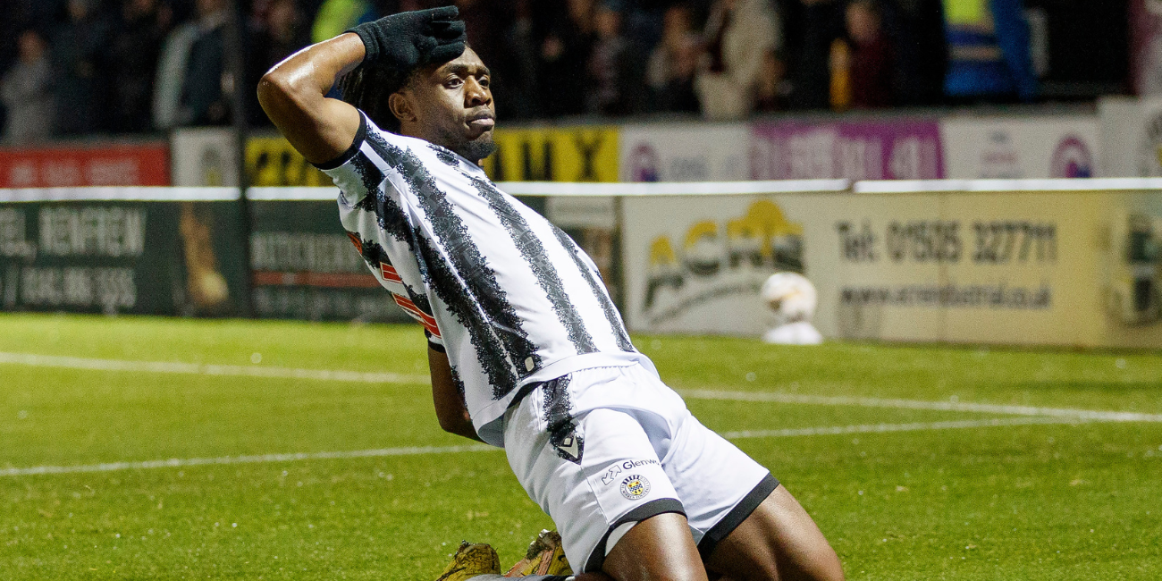 Dan Nlundulu celebrates his goal against Hearts