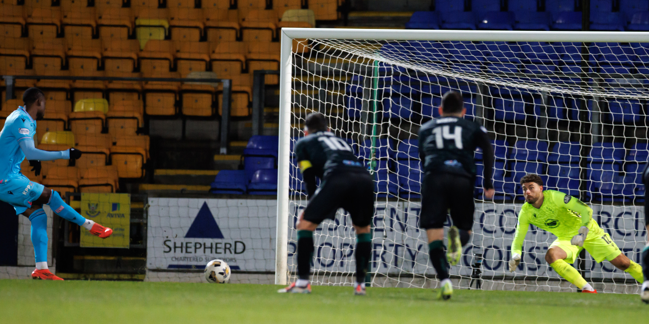 Roland Idowu slots home the winner from the penalty spot (Image: Willie Vass)