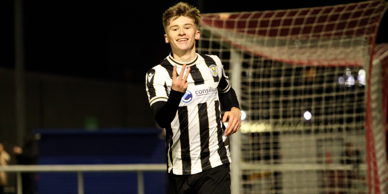 Evan Mooney celebrates his hat-trick