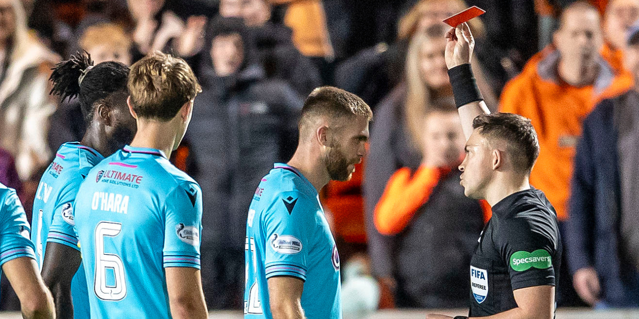 Marcus Fraser is shown a red card by referee Matthew MacDermid