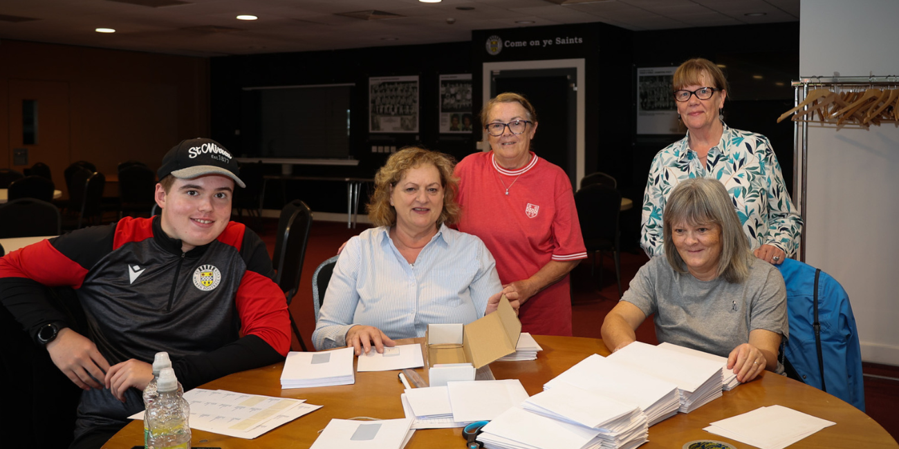 Our volunteer group packing tickets